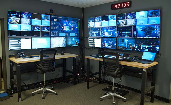 Live Stream event control room with 8 video monitors and video switcher 