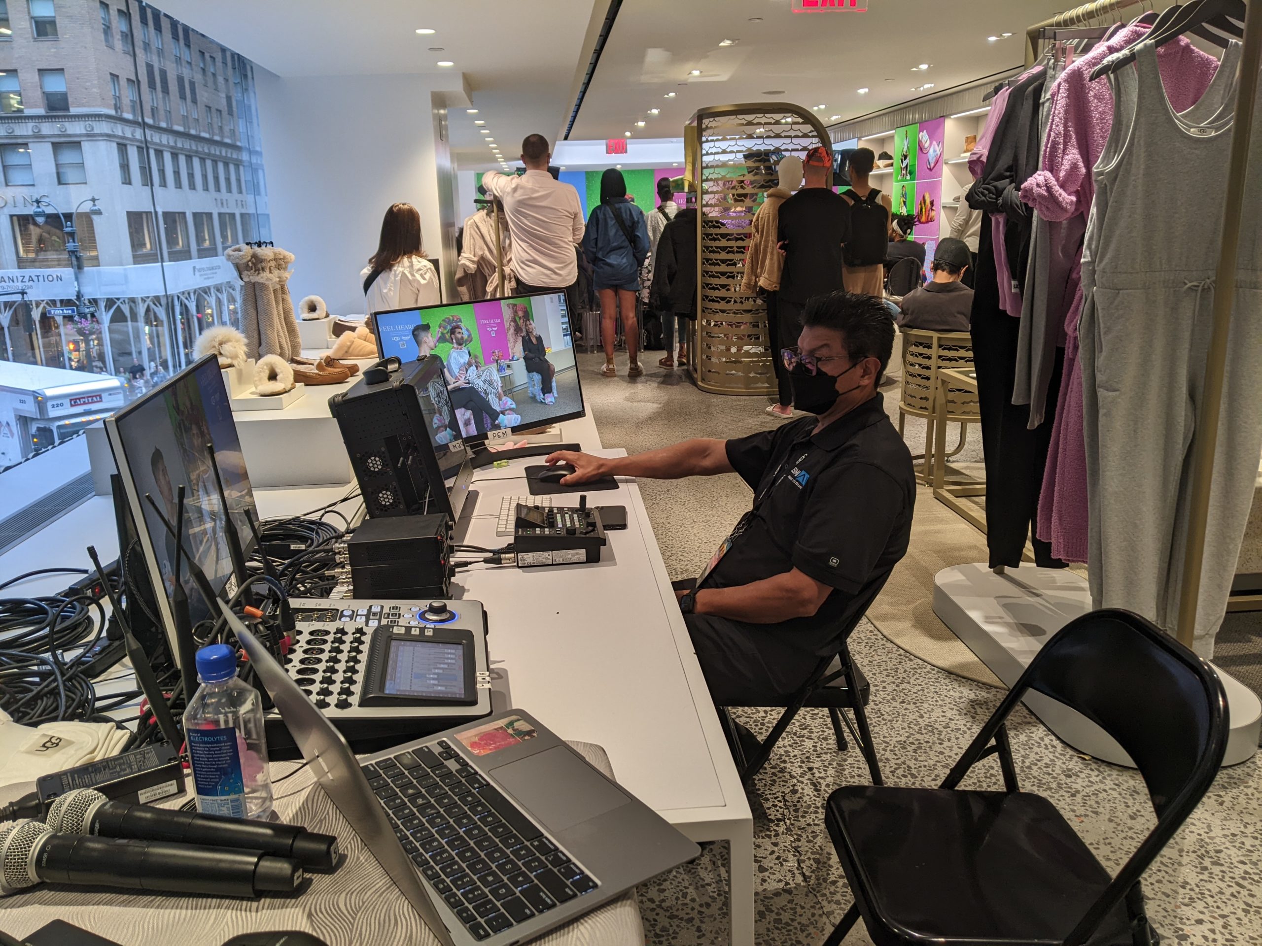 Hybrid events being held at a retail clothing store on a busy street